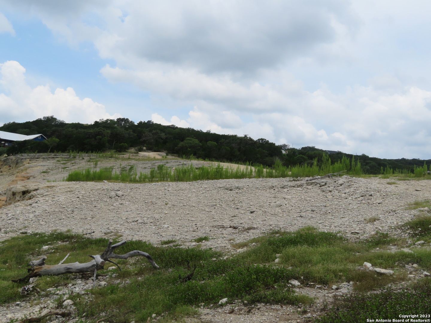 0 Hilltop Loop Lakehills, TX 78063 - Photo 32 of 32 a view of lake with mountain in background