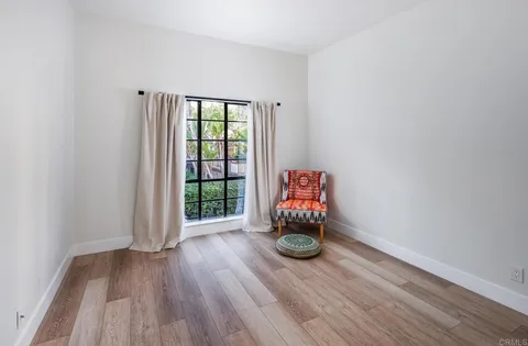 a view of livingroom with furniture and wooden floor