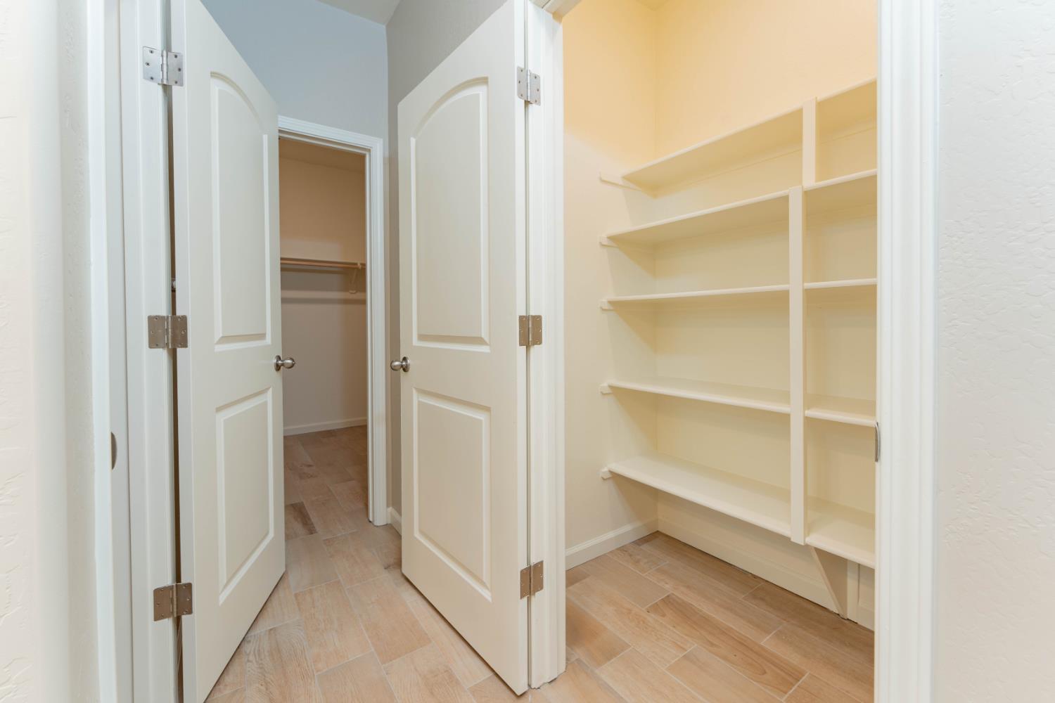 30480 Bellwood Road Visalia, CA 93291 - Photo 22 of 37 a view of closet area with empty racks