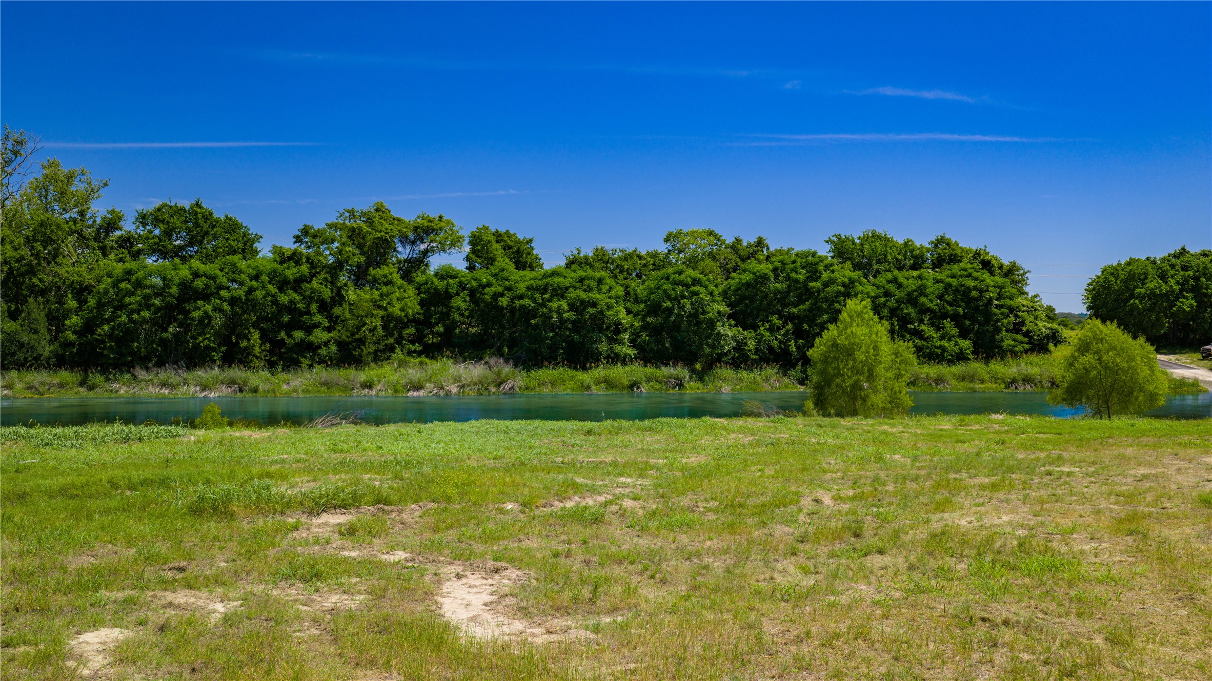 Tbd Lost Acres Loop Blanco, TX 78606 - Photo 22 of 39 a view of a field with an trees
