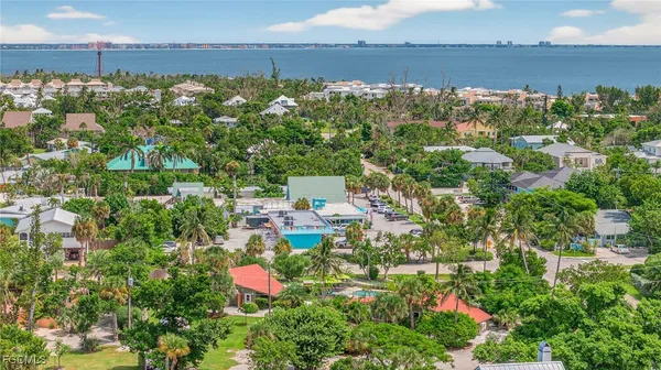 a view of lake and houses with outdoor space