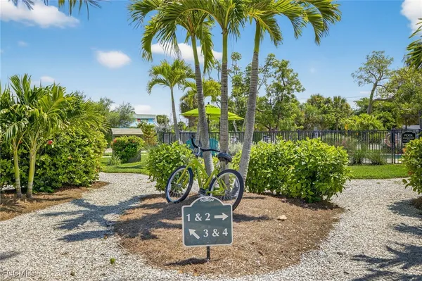 a sign on the side of the road