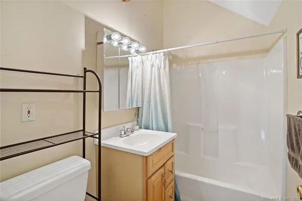 a bathroom with a sink and a bathtub