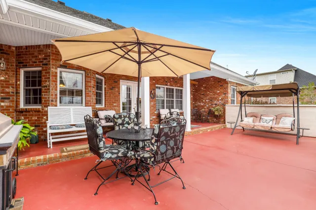 a building outdoor space with patio furniture