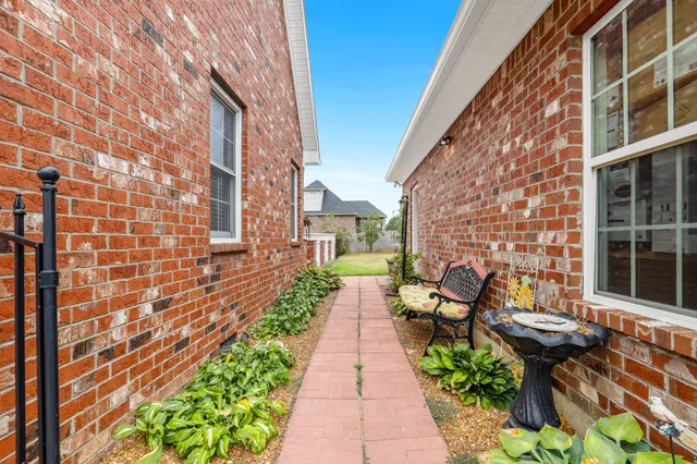 a front view of house with an outdoor space and seating