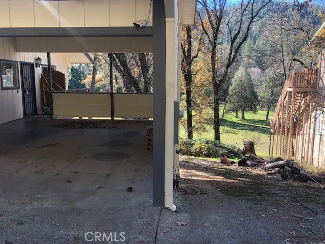 a view of a car park in front of a building
