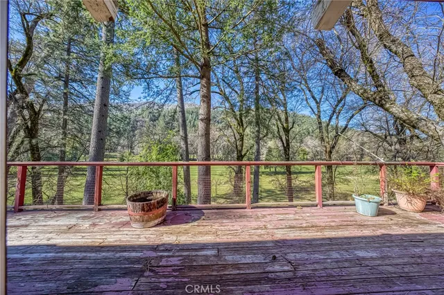 a view of outdoor space with wooden fence