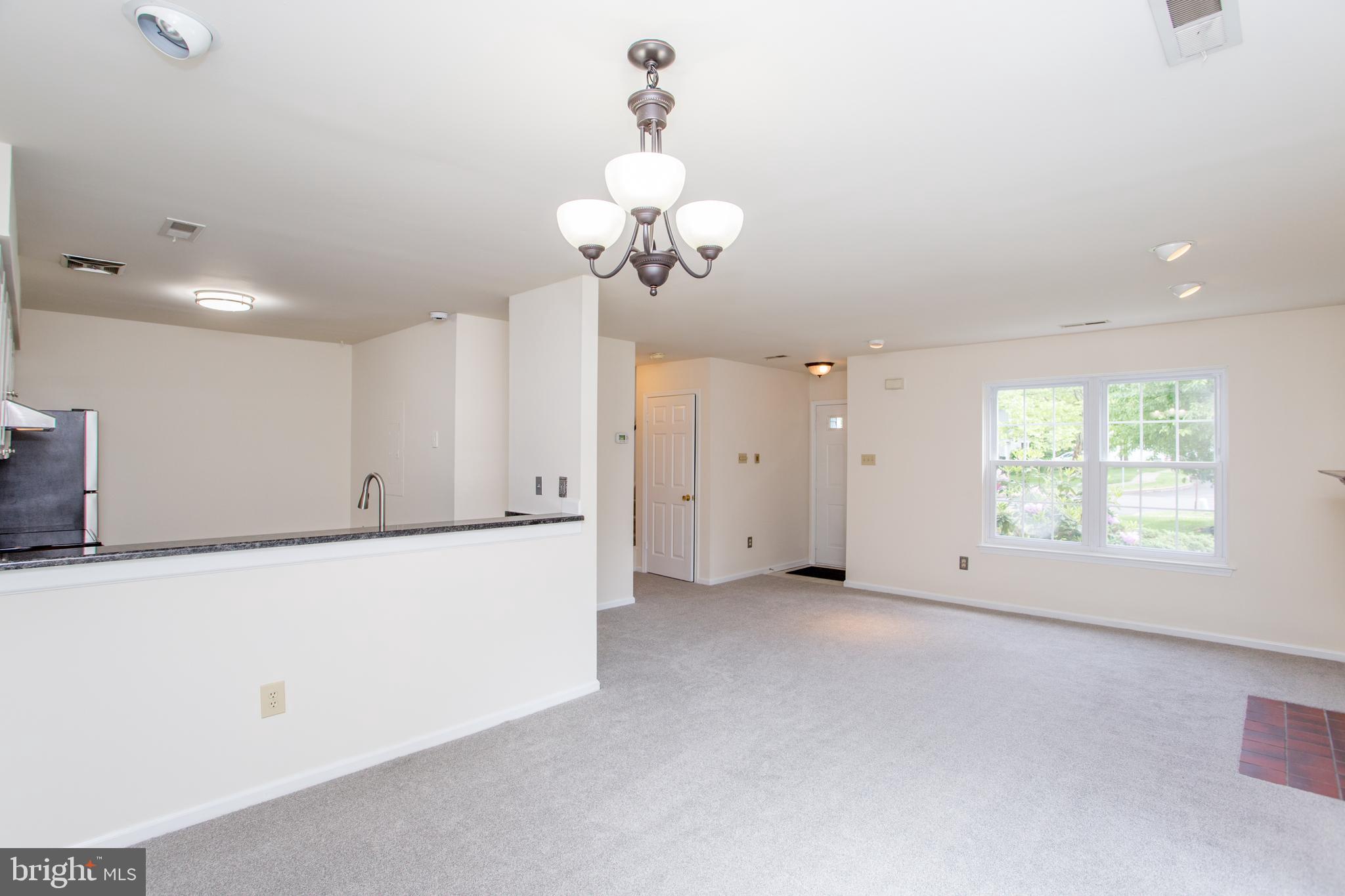 144 Carousel Circle Doylestown, PA 18901 - Photo 17 of 40 a view of a livingroom with a chandelier