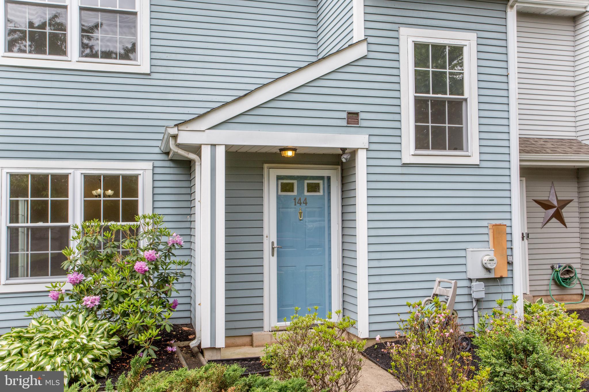 144 Carousel Circle Doylestown, PA 18901 - Photo 2 of 40 a front view of a house with plants