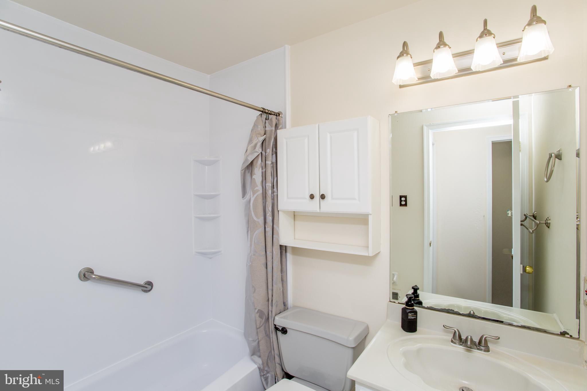 144 Carousel Circle Doylestown, PA 18901 - Photo 31 of 40 a bathroom with a sink toilet and shower