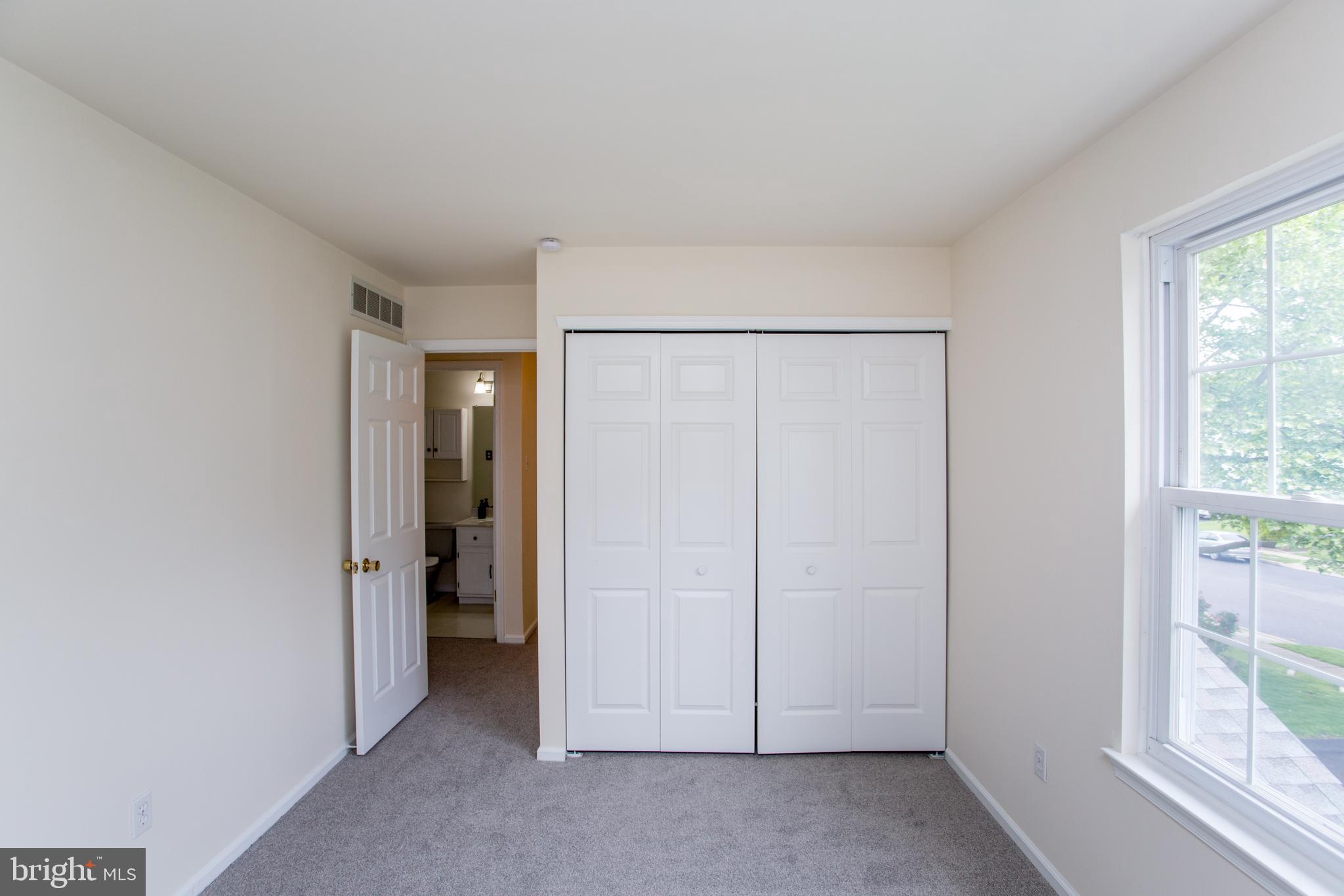 144 Carousel Circle Doylestown, PA 18901 - Photo 37 of 40 an empty room with windows and closet