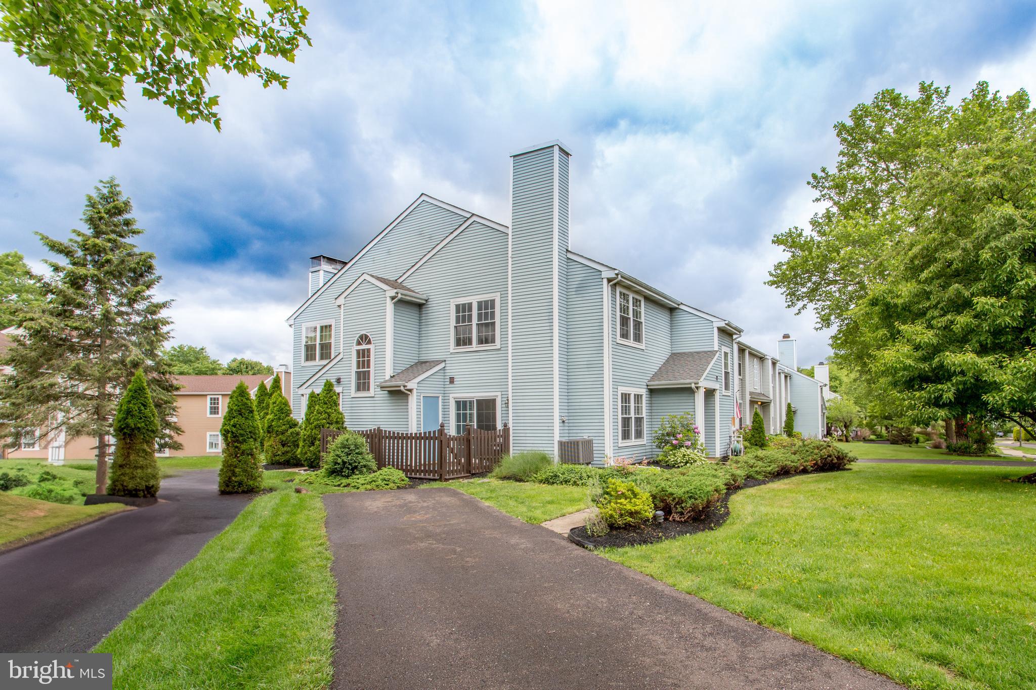 144 Carousel Circle Doylestown, PA 18901 - Photo 38 of 40 a front view of a house with a yard and trees