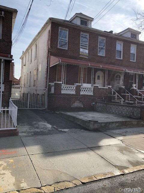 1006 Lenox Road Brooklyn, NY 11212 - Photo 3 of 4 a front view of a house with entertaining space