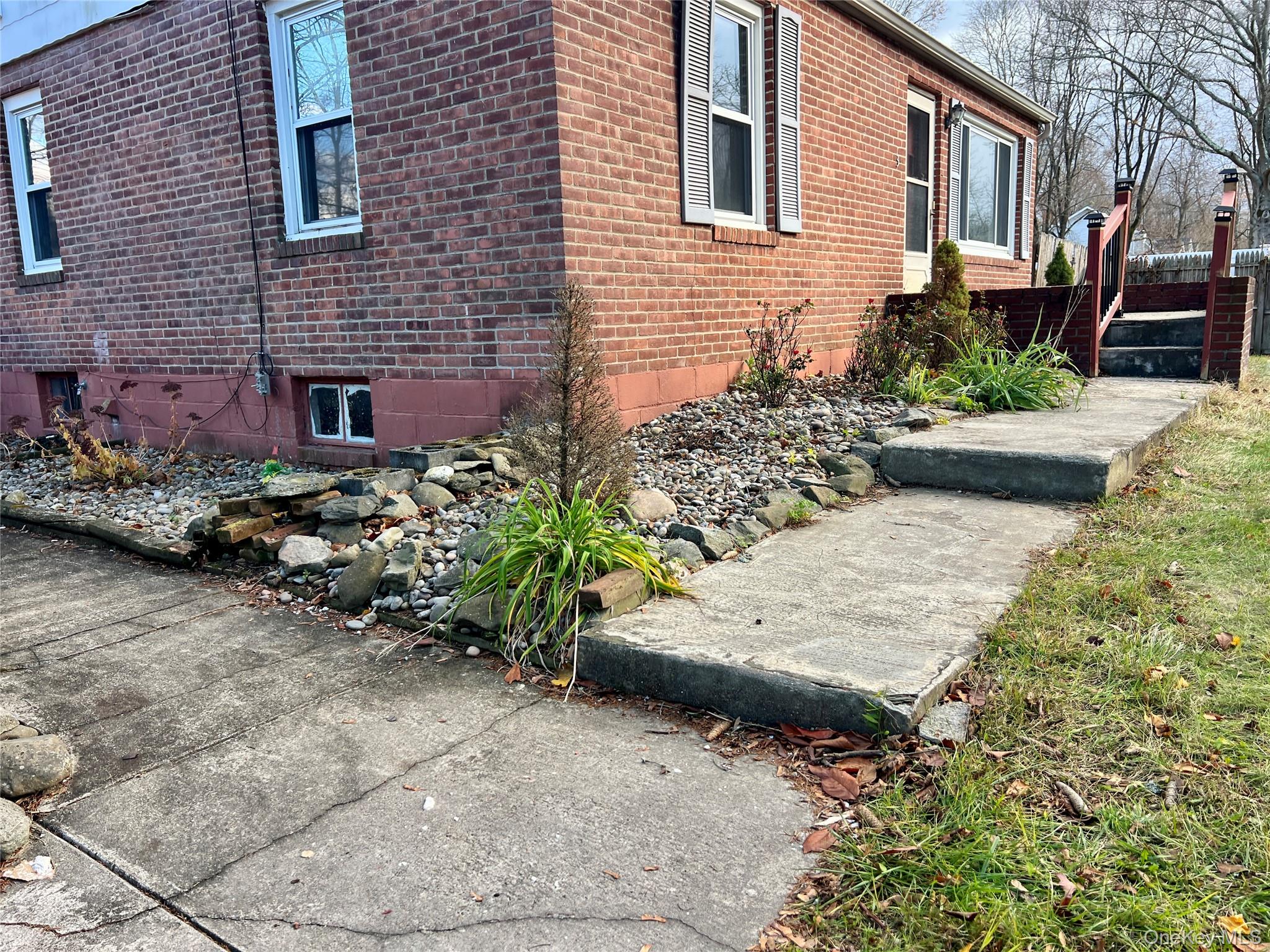 3 Davis Road Poughkeepsie, NY 12603 - Photo 6 of 34 View of home's exterior with brick siding