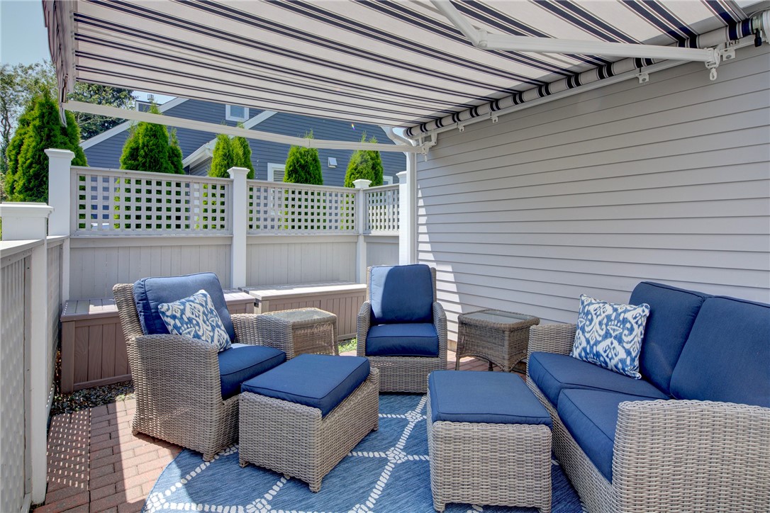 406 Corey Lane Middletown, RI 02842 - Photo 18 of 36 Private fenced patio with remote control awning