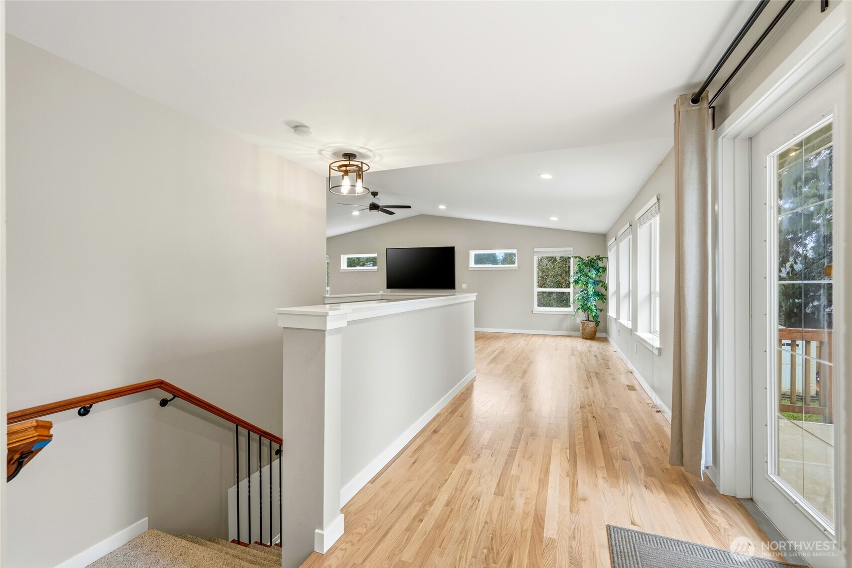 32130 27th Avenue Southwest Federal Way, WA 98023 - Photo 15 of 40 a view of a hallway with wooden floor and staircase