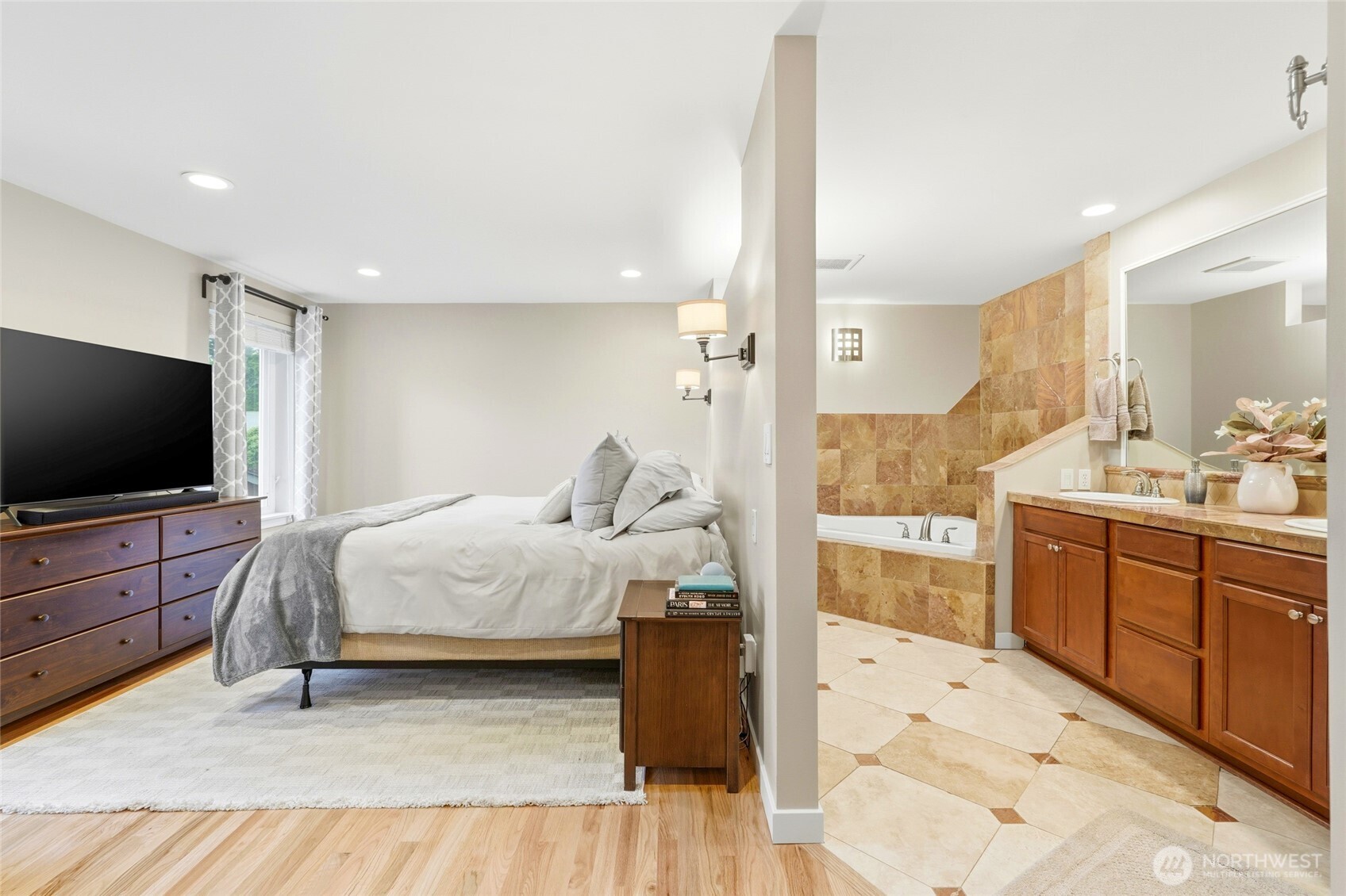 32130 27th Avenue Southwest Federal Way, WA 98023 - Photo 20 of 40 a spacious bedroom with a bed and a flat screen tv
