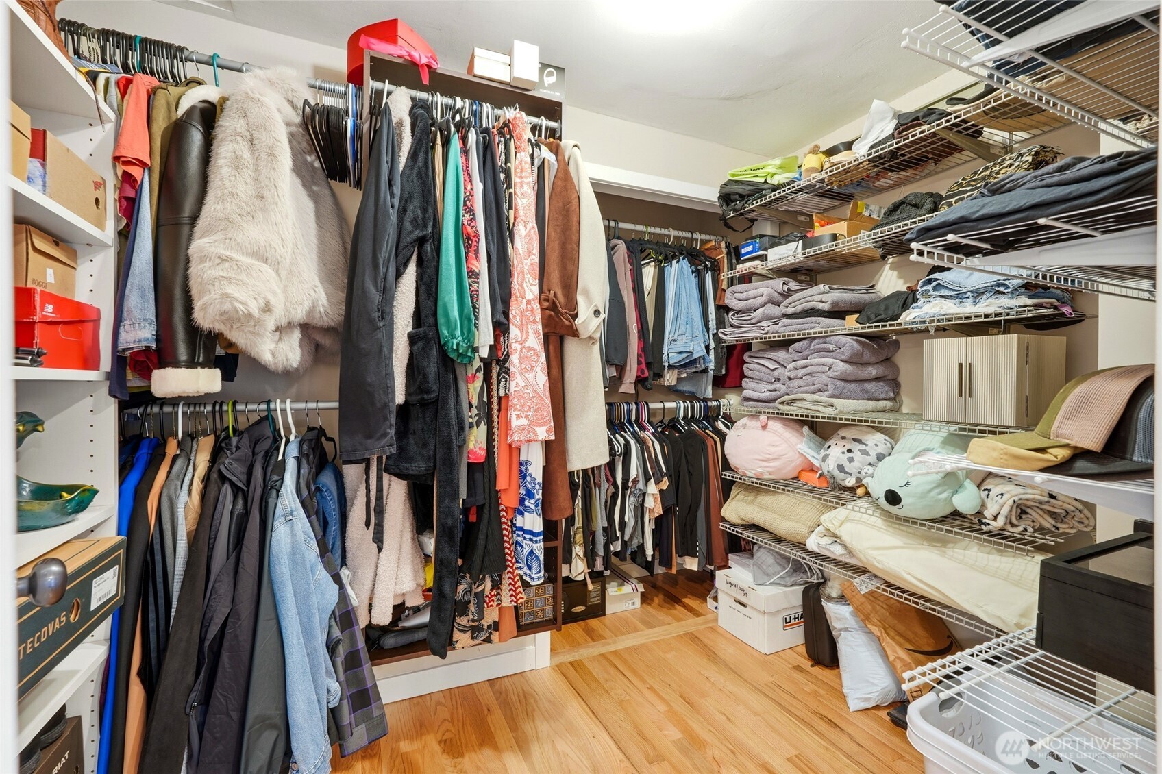 32130 27th Avenue Southwest Federal Way, WA 98023 - Photo 21 of 40 a view of walk in closet with clothes and shoes