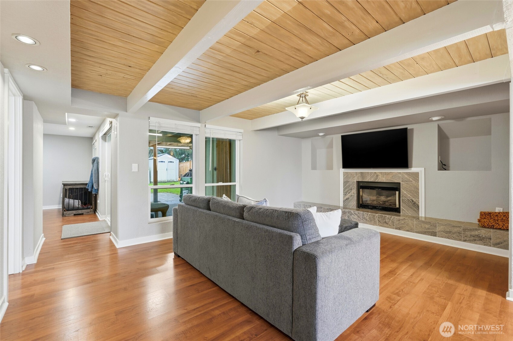 32130 27th Avenue Southwest Federal Way, WA 98023 - Photo 27 of 40 a living room with fireplace furniture and a flat screen tv