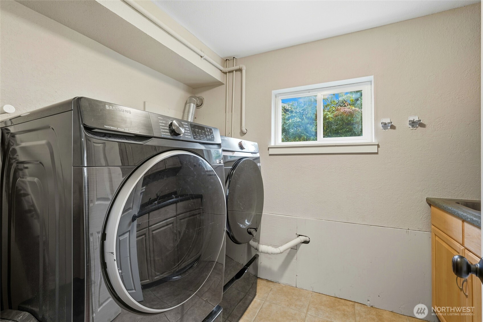 32130 27th Avenue Southwest Federal Way, WA 98023 - Photo 28 of 40 a utility room with dryer and washer
