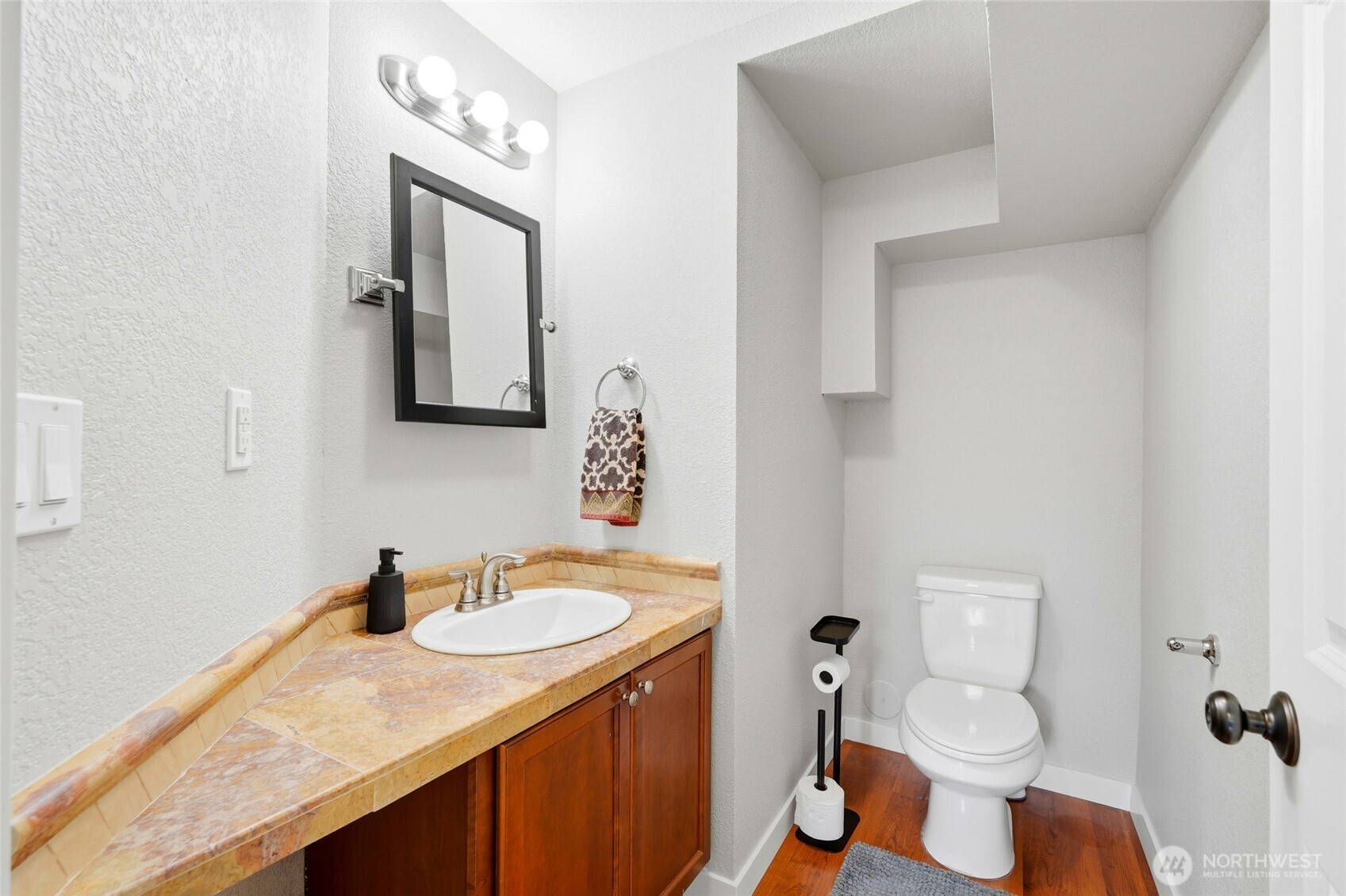 32130 27th Avenue Southwest Federal Way, WA 98023 - Photo 30 of 40 a bathroom with a granite countertop sink toilet and mirror
