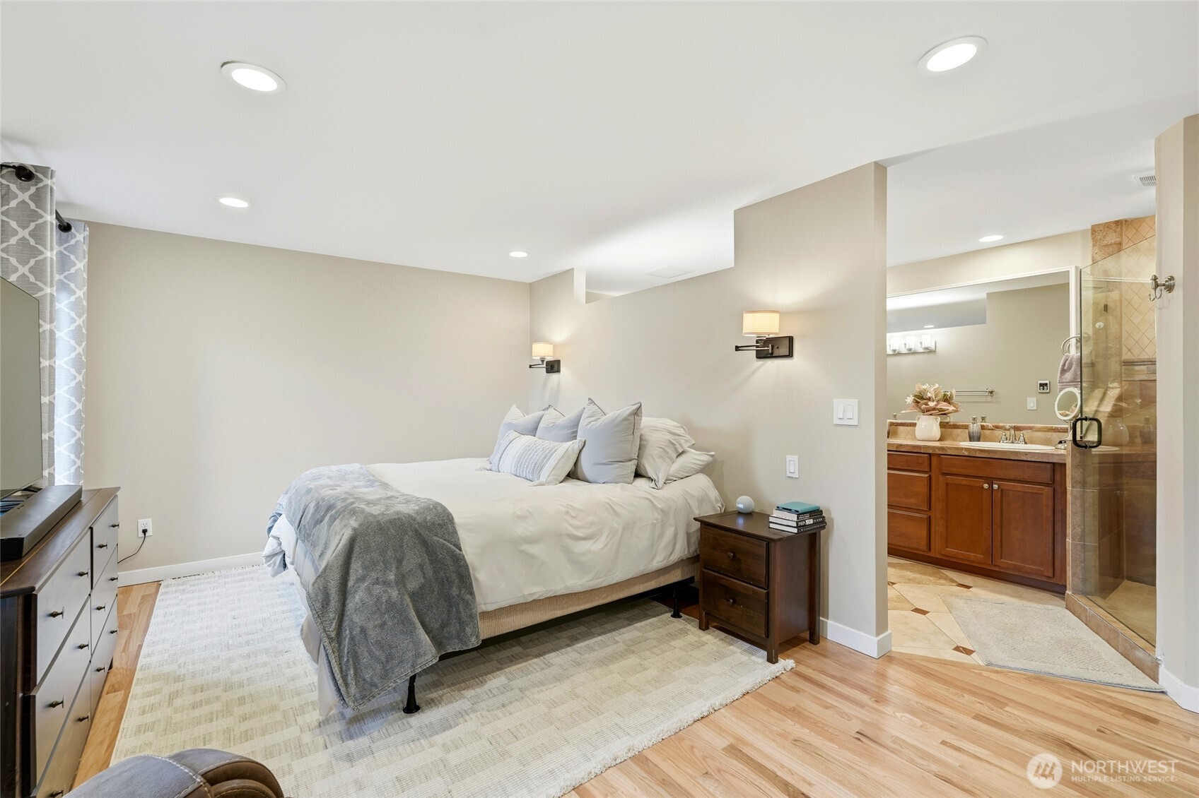 32130 27th Avenue Southwest Federal Way, WA 98023 - Photo 5 of 40 a spacious bedroom with a bed and a flat screen tv