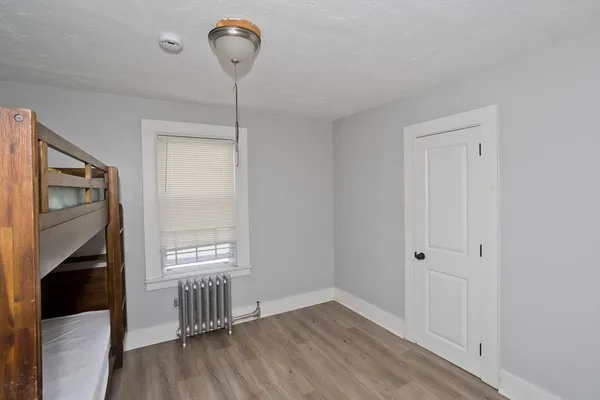 a view of room with stairs and a ceiling fan