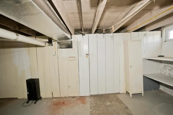 a view of a hallway with wooden floors