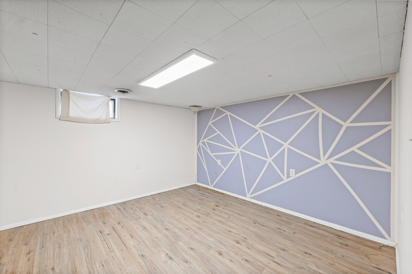 1511 Paula Drive Champaign, IL 61821 - Photo 18 of 24 an empty room with wooden floor and windows