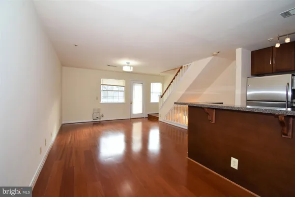 a view of a livingroom with a door