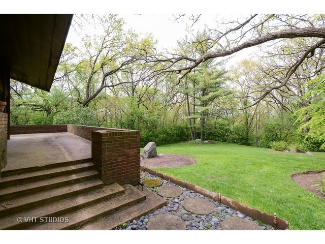 19 West County Line Road Barrington Hills, IL 60010 - Photo 14 of 22 a view of a yard with wooden fence