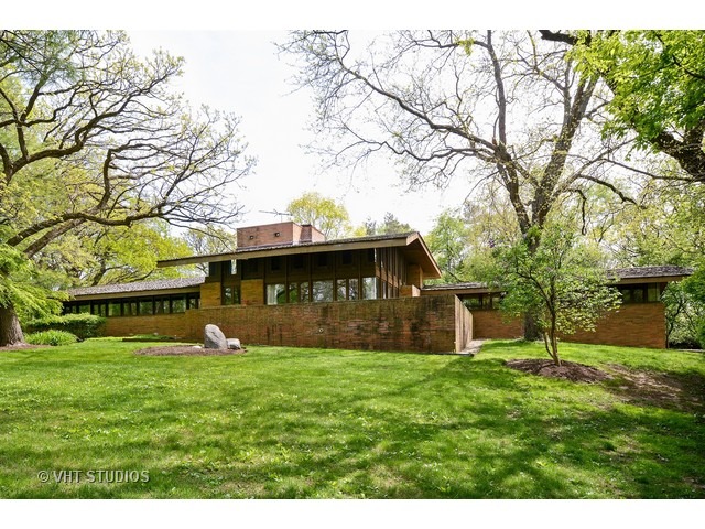 19 West County Line Road Barrington Hills, IL 60010 - Photo 16 of 22 a view of a house with a yard