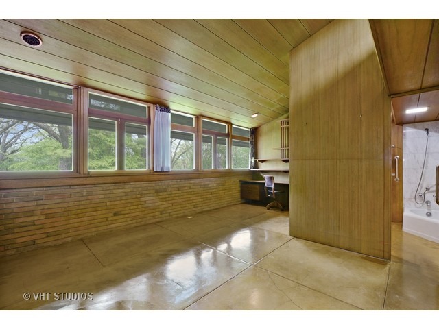 19 West County Line Road Barrington Hills, IL 60010 - Photo 8 of 22 a view of an empty room and window