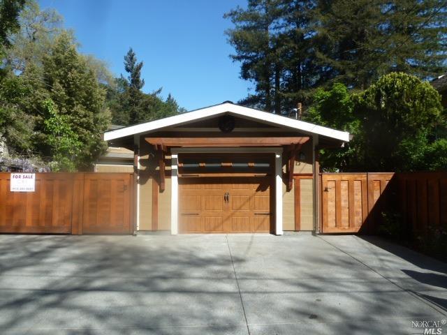19 Manor Road Fairfax, CA 94930 - Photo 1 of 1 a blue house with trees in front of it