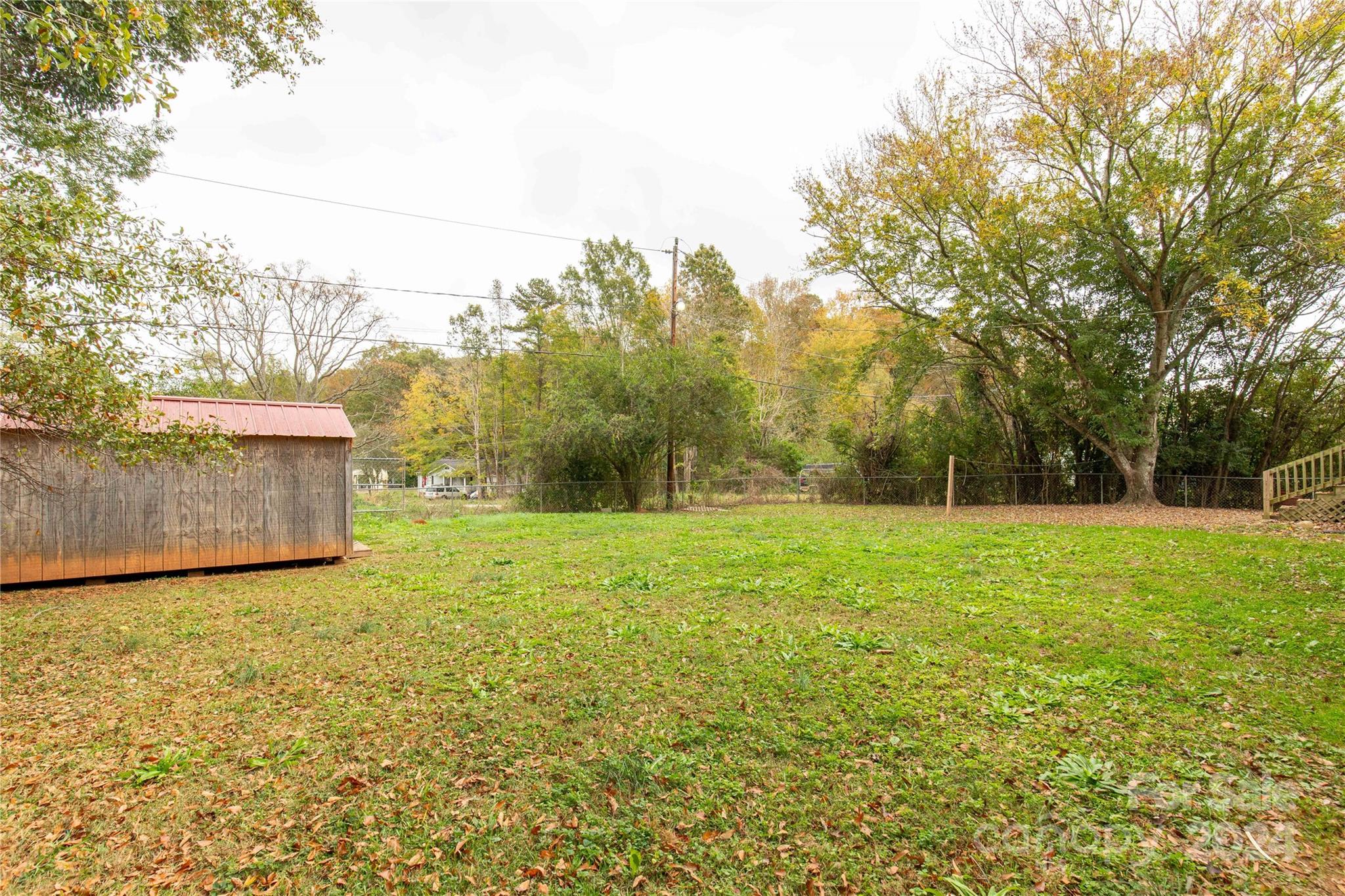 181 Holiday Road Lancaster, SC 29720 - Photo 13 of 21 a view of a field of grass and trees