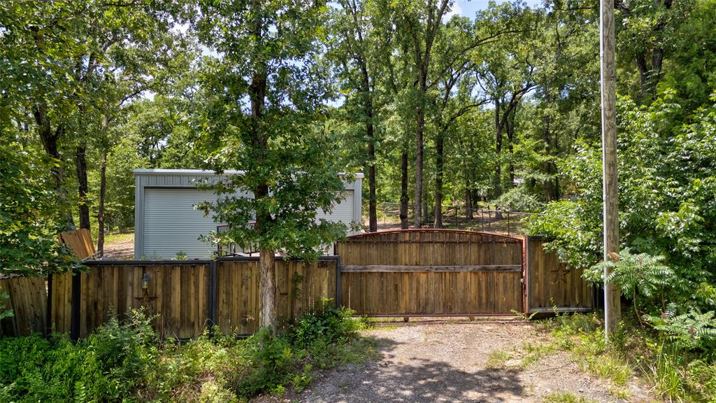 136 Kings Row Malakoff, TX 75148 - Photo 1 of 22 a view of a backyard