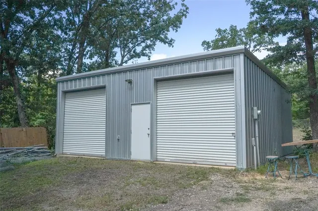 a view of a house with a garage