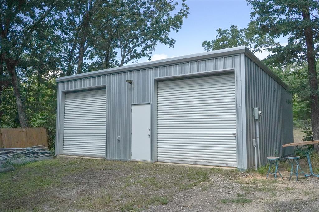 136 Kings Row Malakoff, TX 75148 - Photo 12 of 22 a view of a house with a garage