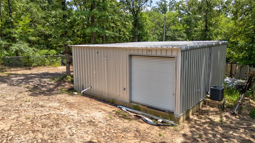 136 Kings Row Malakoff, TX 75148 - Photo 9 of 22 a view of a backyard