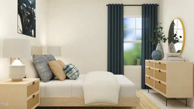 a bedroom with a large bed and a dresser