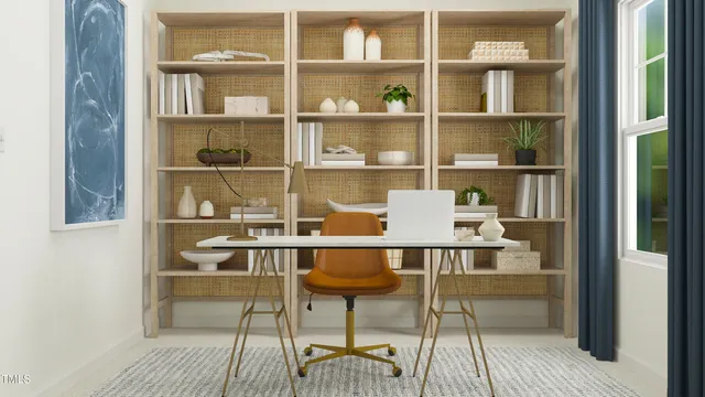 a room with a table and a book shelf