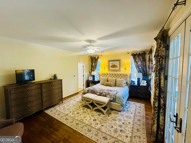 a bedroom with a bed and a fireplace