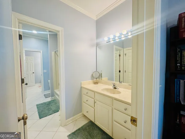 a view of a livingroom with furniture and cabinet