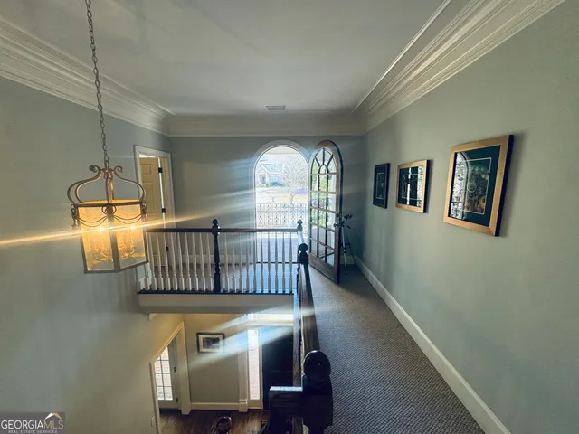 a bedroom with a bed and a bathroom