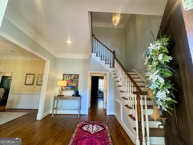 a view of entryway livingroom and hall
