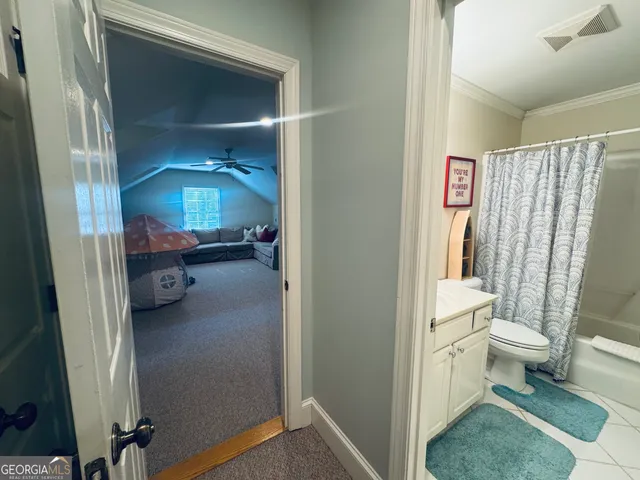 a view of a swimming pool with an outdoor space and seating area