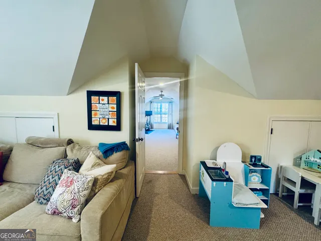 a view of a street with a yard