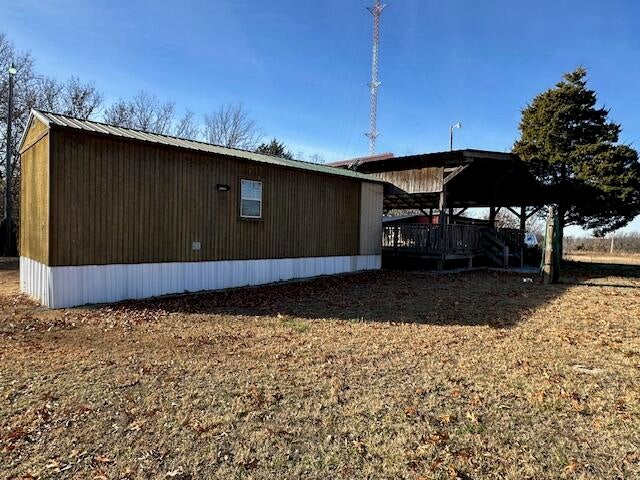 15748 South 4420 Road Bluejacket, OK 74333 - Photo 23 of 33 cabin side