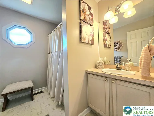 a bed room with a bed and a table