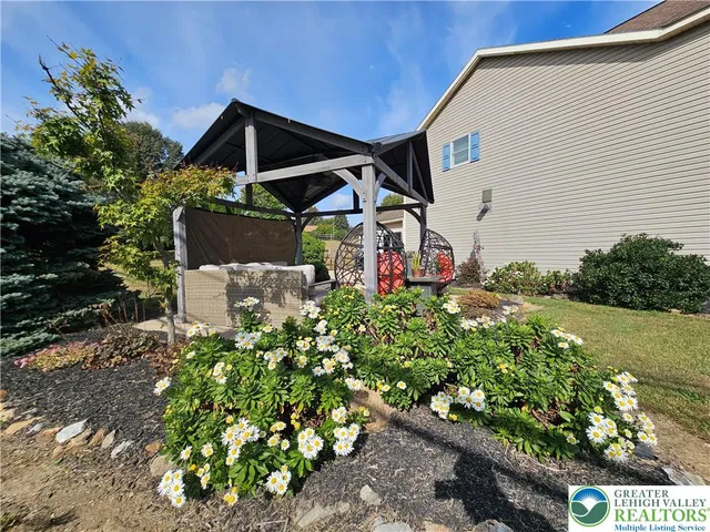 a view of a two chair in front of the house